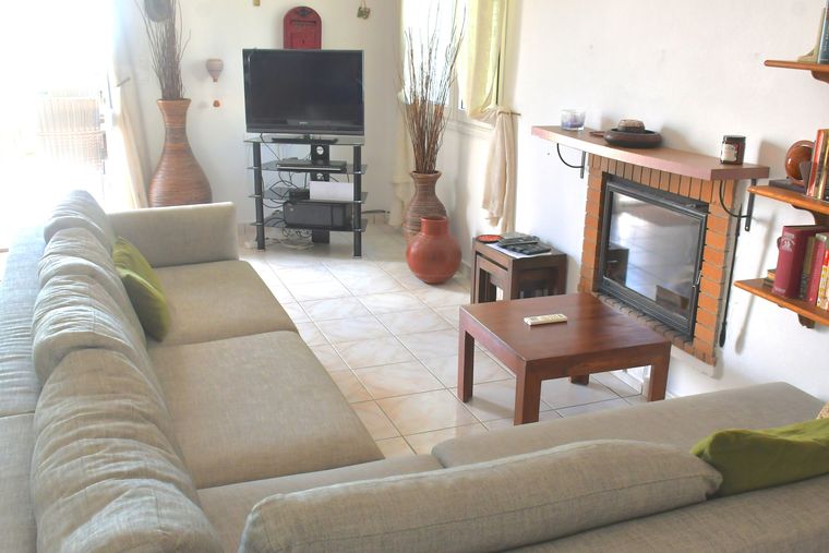 Villa Mailin living room with sofa and fireplace